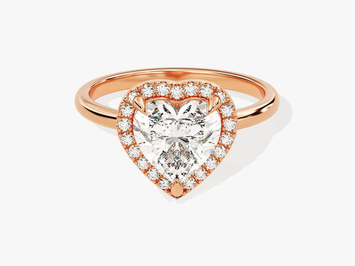 Heart cut halo engagement ring with IGI certified center diamond