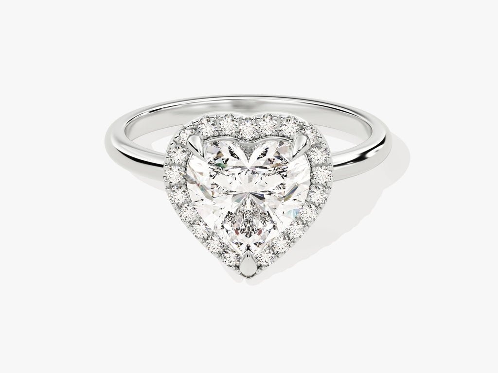 Lifestyle shot of heart halo diamond ring on hand