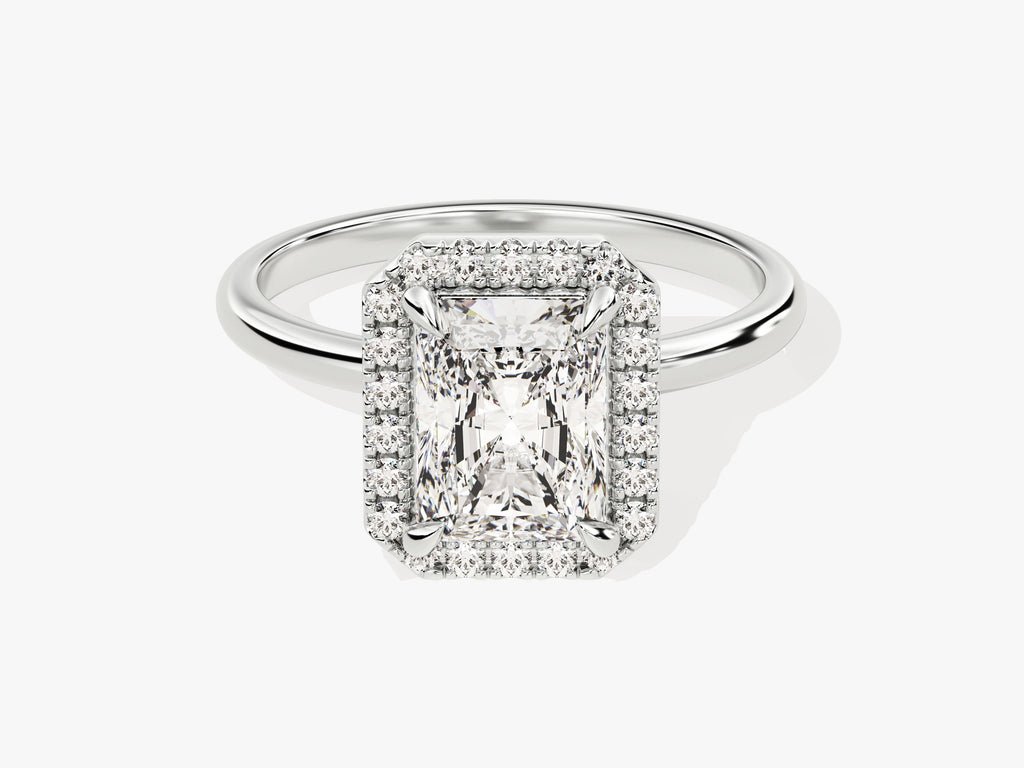 Radiant halo engagement ring shown on hand for true-to-life sizing