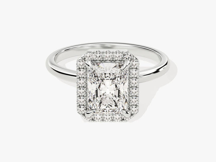 Radiant halo engagement ring shown on hand for true-to-life sizing