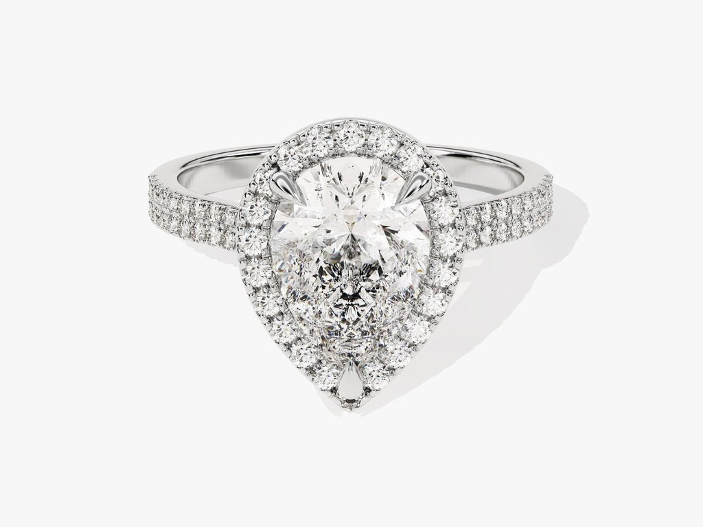 Profile view of pear cut pave engagement ring band