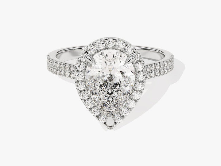 Profile view of pear cut pave engagement ring band