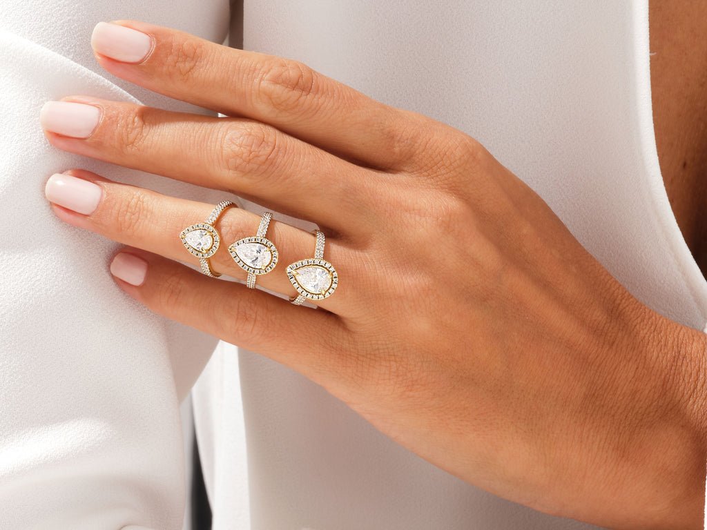 Pear pave engagement ring viewed from the side