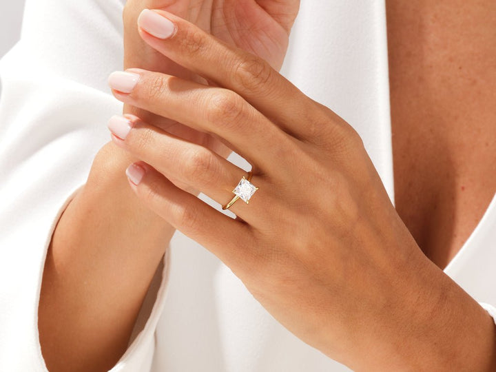 Top-down view of princess cut solitaire engagement ring
