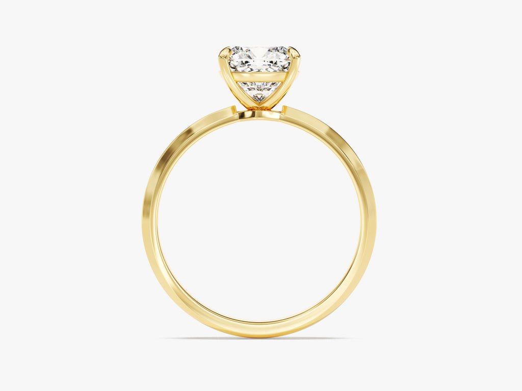 Macro shot of cushion cut diamond facets in solitaire ring setting