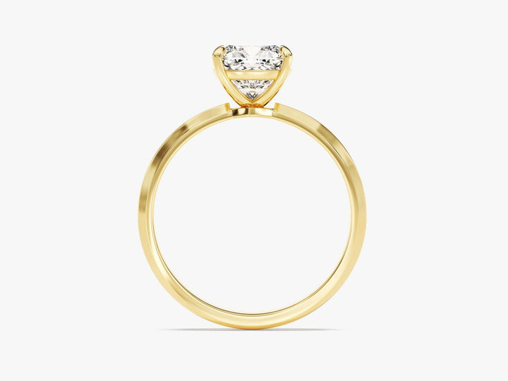 Macro shot of cushion cut diamond facets in solitaire ring setting