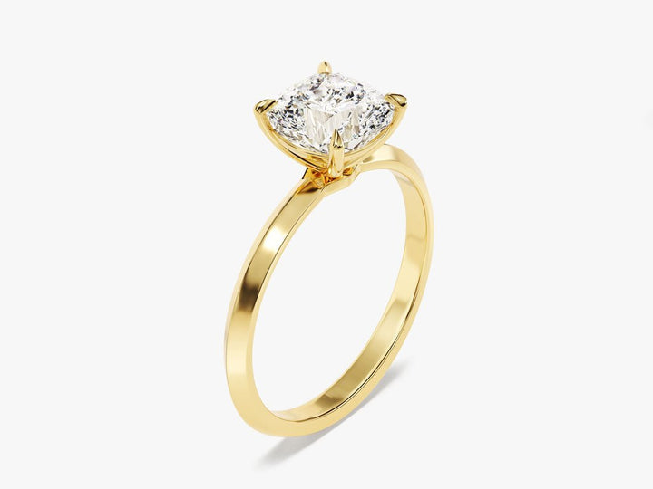 Detailed close-up of cushion solitaire diamond engagement ring