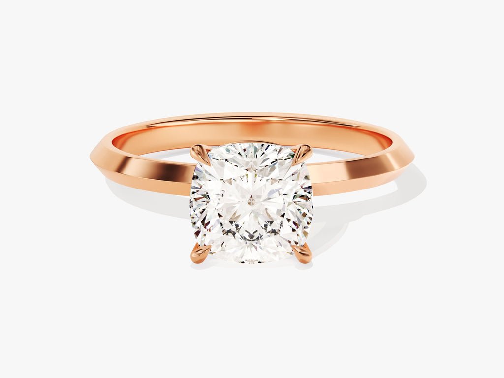 Cushion solitaire engagement ring close-up highlighting diamond sparkle