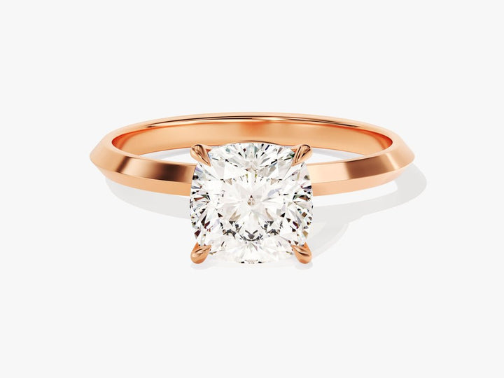 Cushion solitaire engagement ring close-up highlighting diamond sparkle