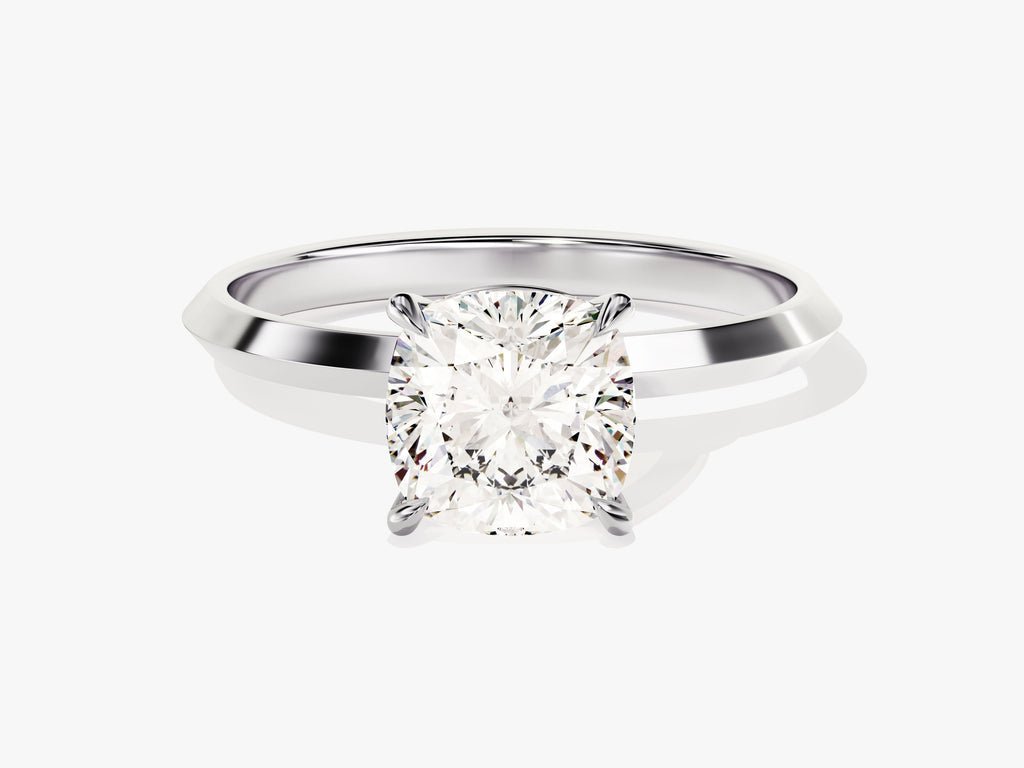 Cushion solitaire engagement ring close-up showing high clarity diamond clarity