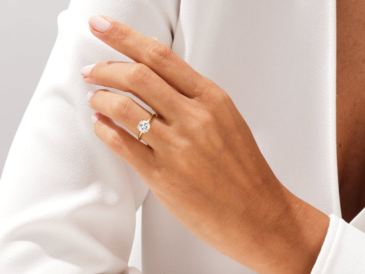 Cushion cut engagement ring side view showing band detail