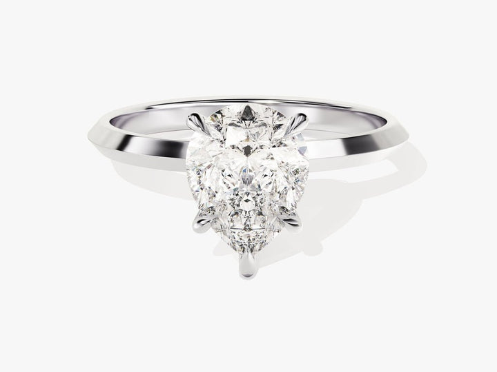 Fine craftsmanship detail on pear solitaire engagement ring
