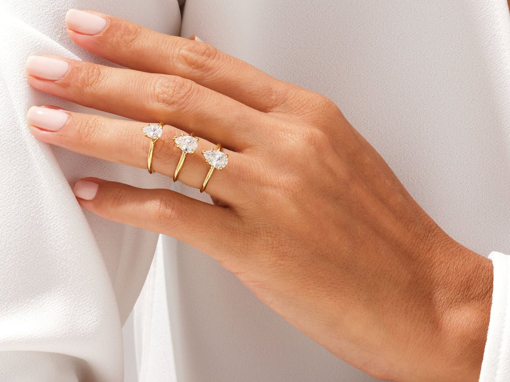 Pear solitaire engagement ring with brilliant diamond sparkle
