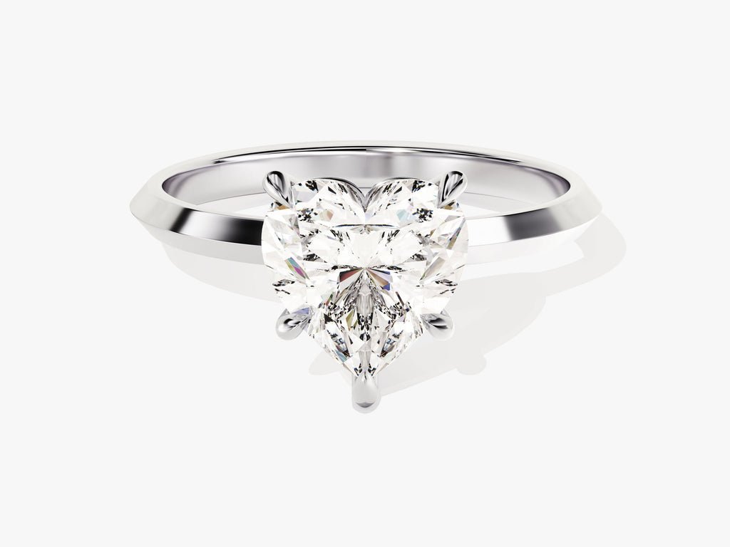 Heart solitaire lab grown diamond ring fitted on finger