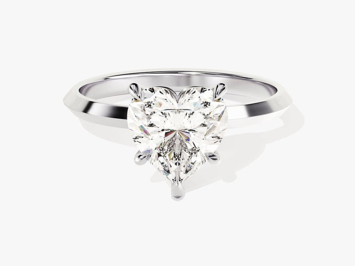 Heart solitaire lab grown diamond ring fitted on finger