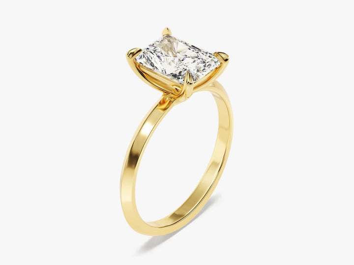 Radiant solitaire diamond ring displayed on jewelry stand