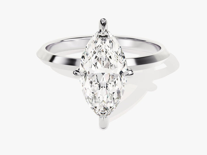 Marquise solitaire diamond ring displayed on jewelry stand