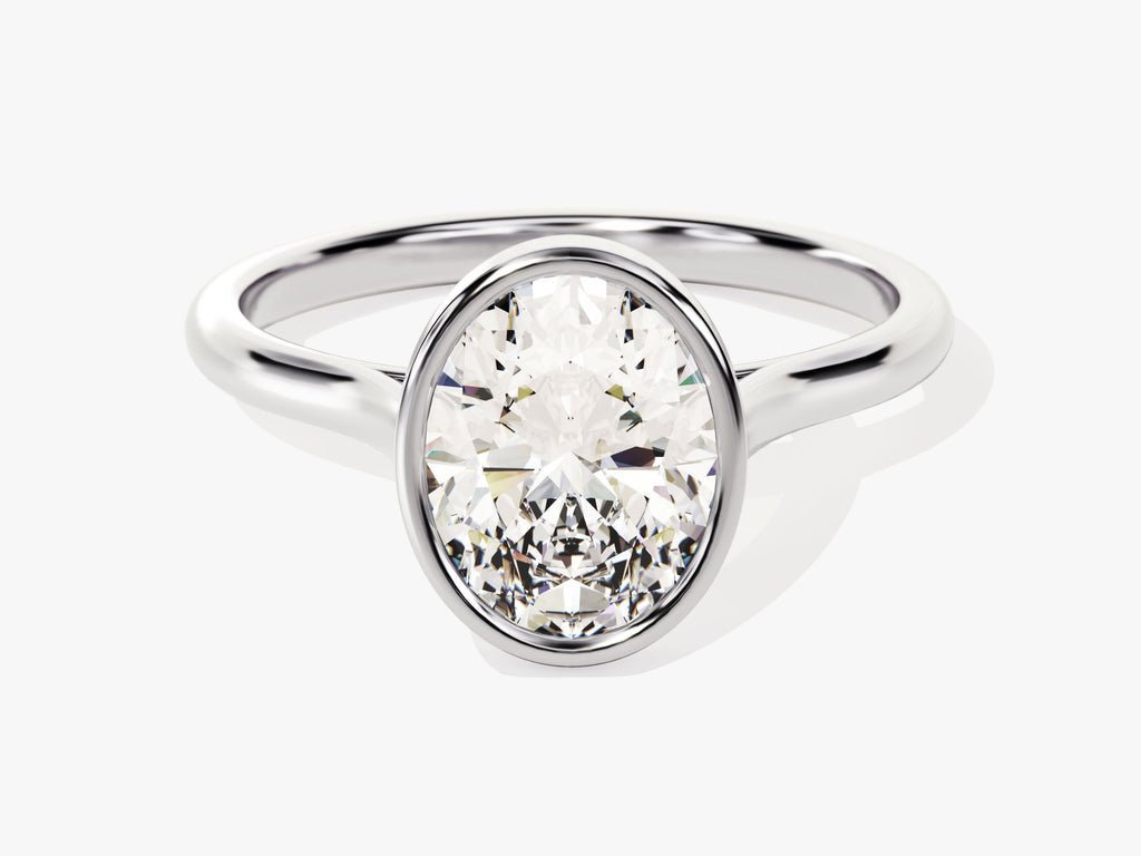Oval cut engagement ring shown with authenticity certificate