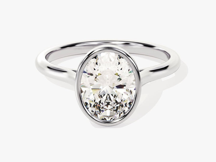 Oval cut engagement ring shown with authenticity certificate