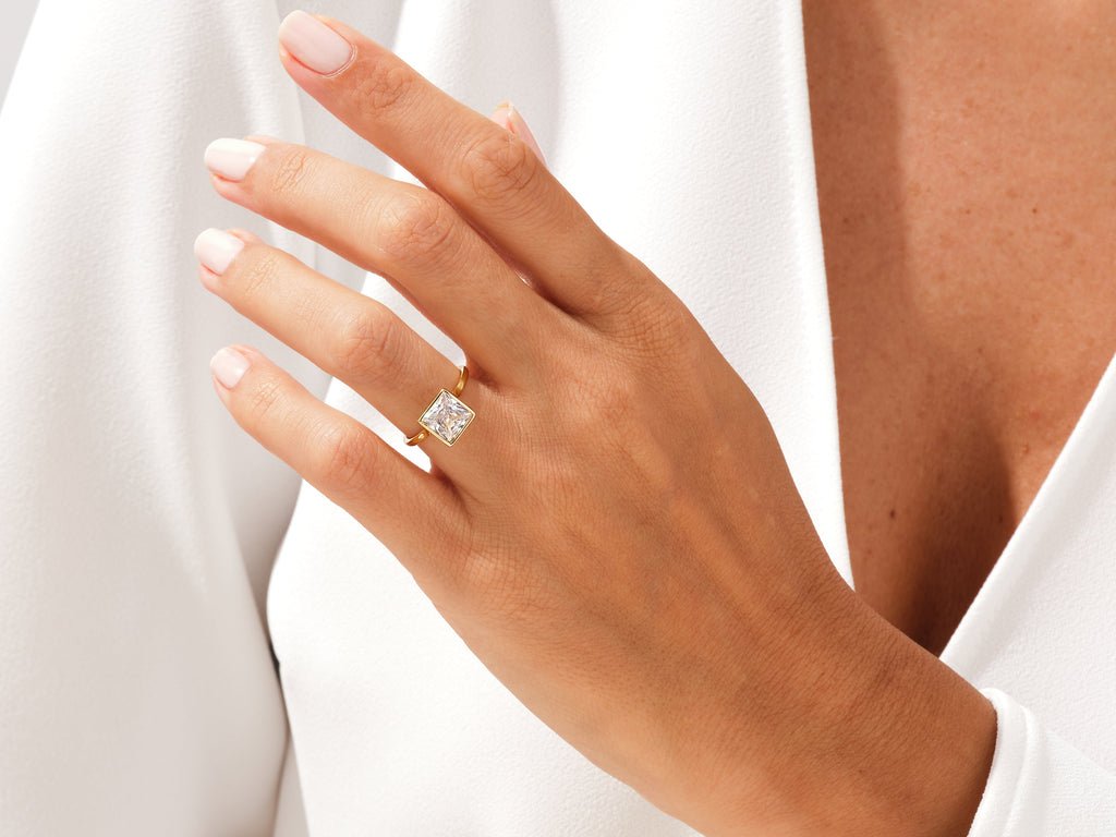 Princess cut engagement ring side view showing band detail