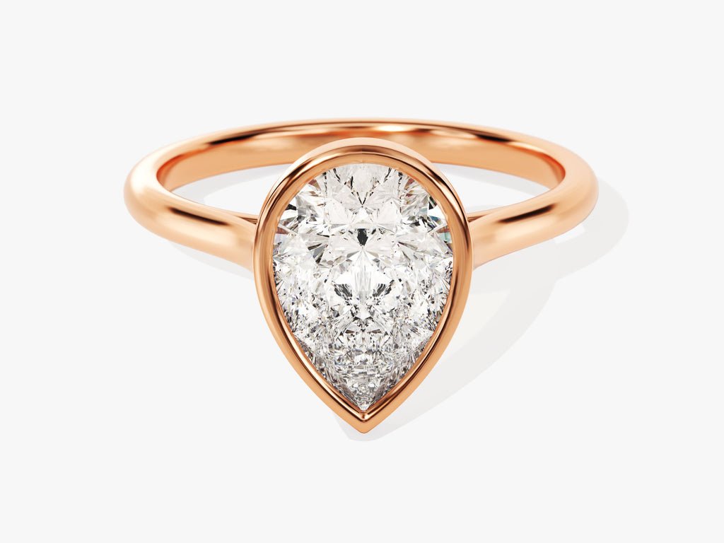 Pear bezel engagement ring with certified lab grown diamond