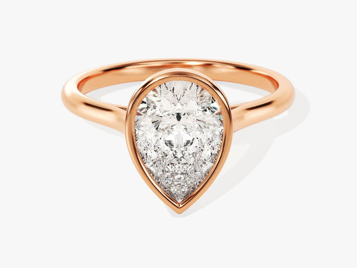 Pear bezel engagement ring with certified lab grown diamond