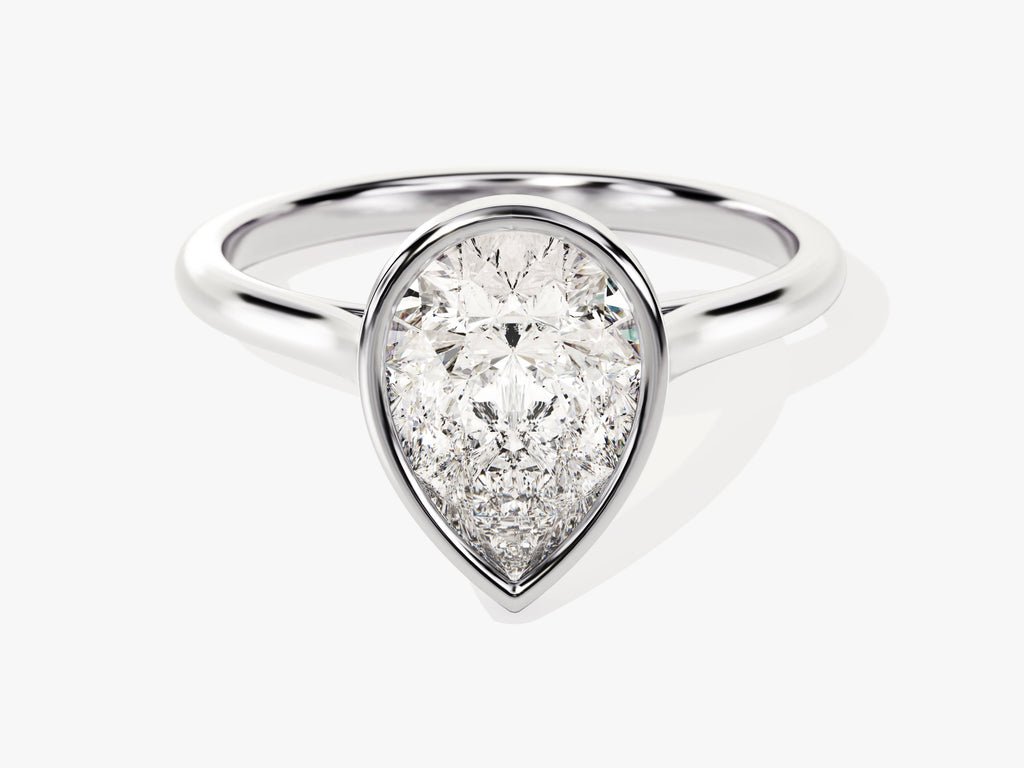 IGI certified pear cut diamond in bezel engagement ring setting