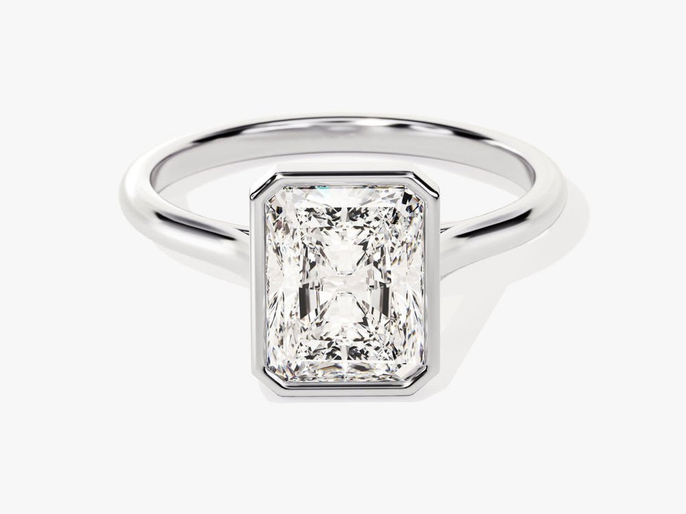 IGI certified radiant cut diamond in bezel engagement ring setting