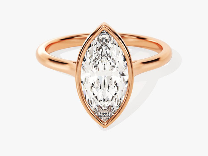 Lifestyle shot of marquise bezel diamond ring on hand