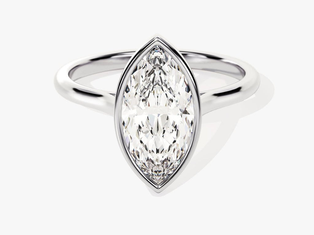 Marquise cut bezel engagement ring shown in real-life wear