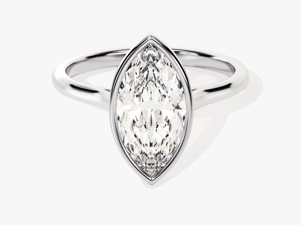 Marquise cut bezel engagement ring shown in real-life wear