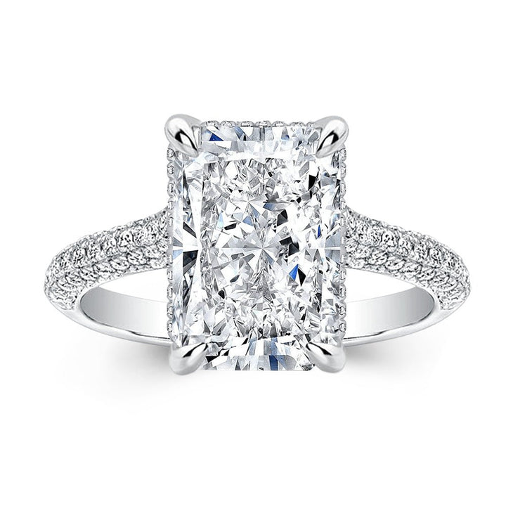 Unboxing view of radiant cut hidden halo diamond engagement ring