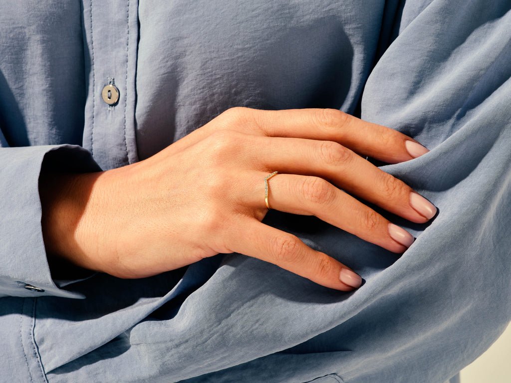 Round diamond wedding band in rose gold