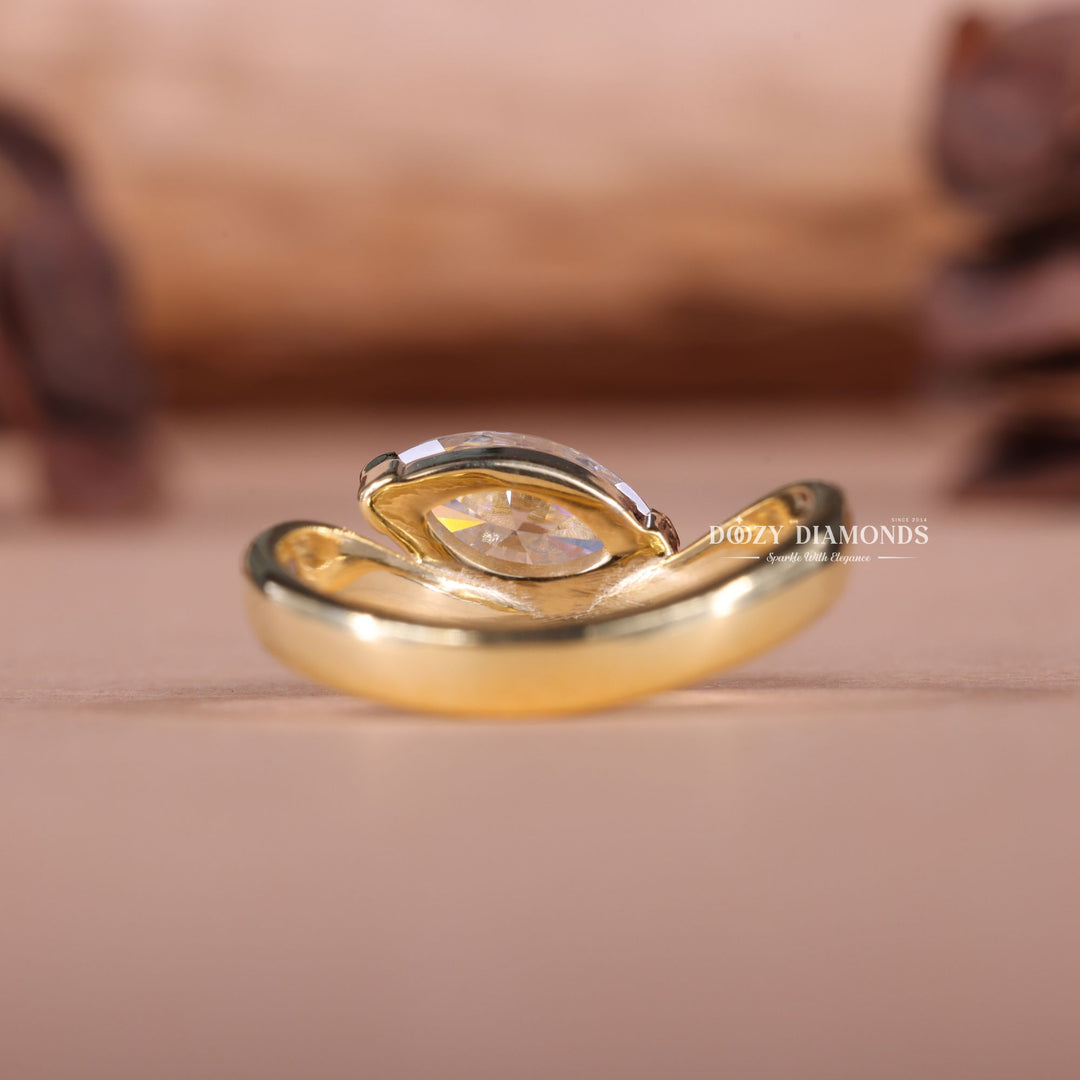 Marquise east west diamond ring presented in signature gift packaging