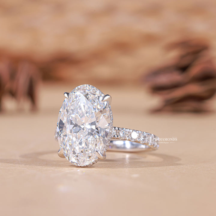 IGI certified oval cut diamond in hidden halo engagement ring setting