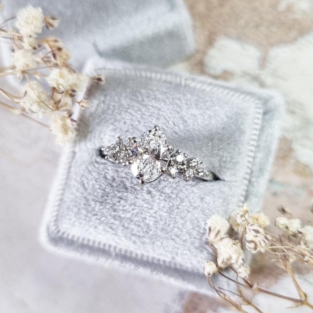 Premium oval cut cluster engagement ring crafted in solid gold