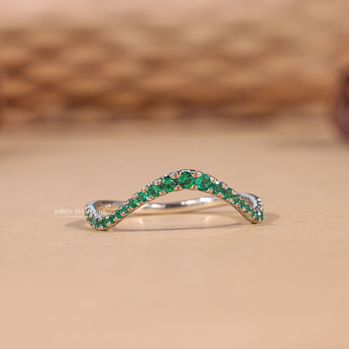 Ethically sourced green round diamond eternity band