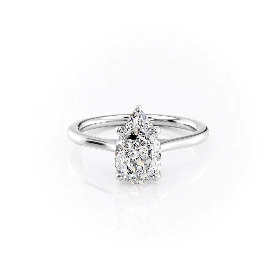Close-up of pear cut center diamond in solitaire engagement ring