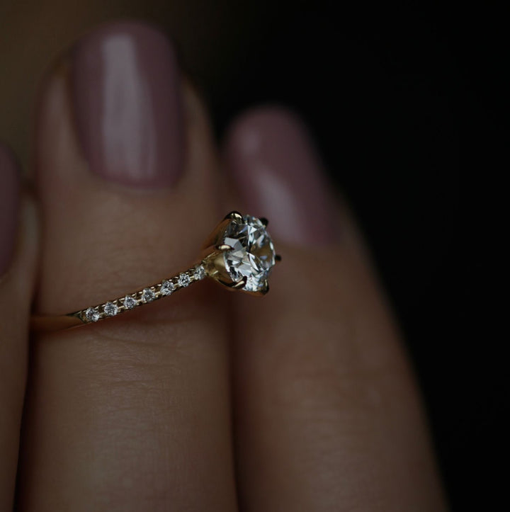 Round solitaire lab grown diamond ring side profile in gold setting