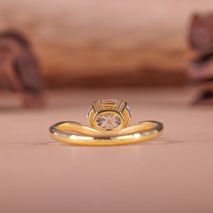 Oval east west diamond engagement ring available in multiple metals