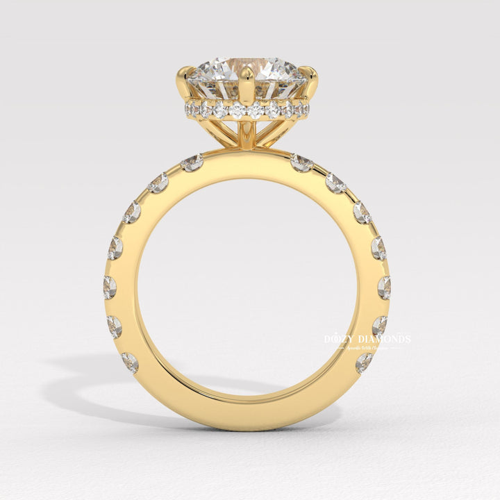 Profile view of round cut hidden halo engagement ring band