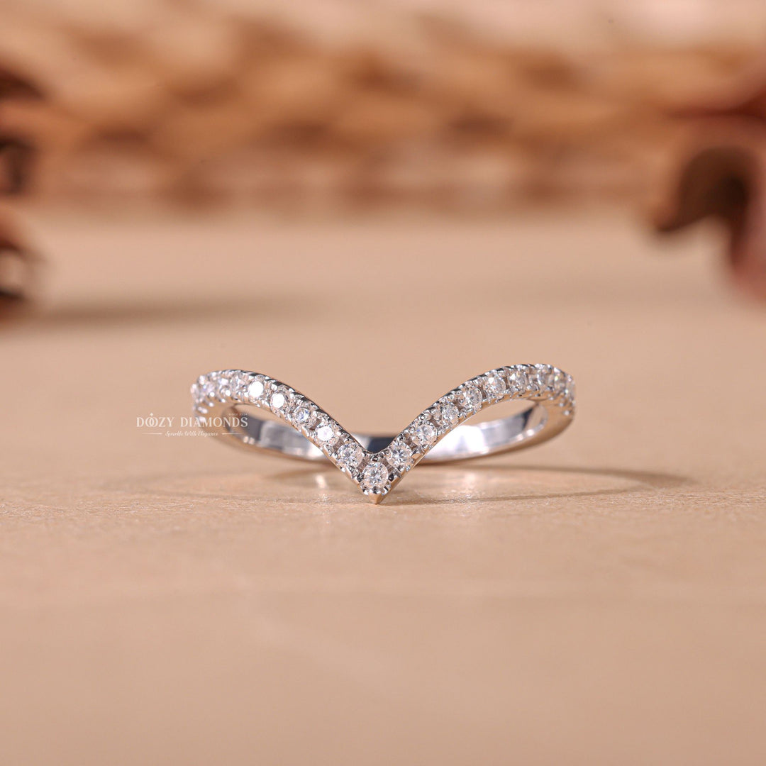 Round diamond band stacked with engagement ring
