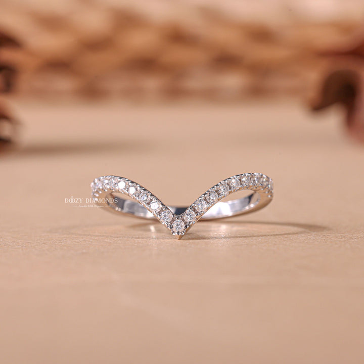 Round diamond band stacked with engagement ring