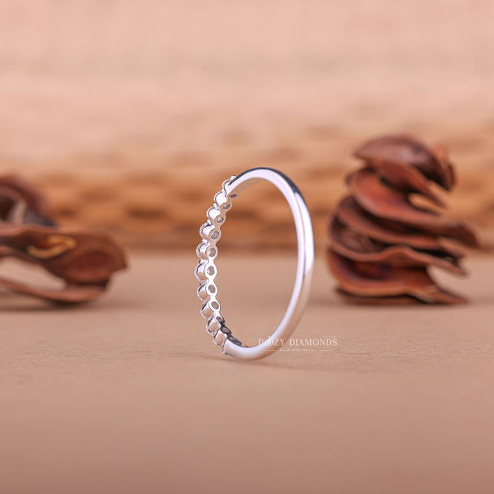 Round diamond band stacked with engagement ring