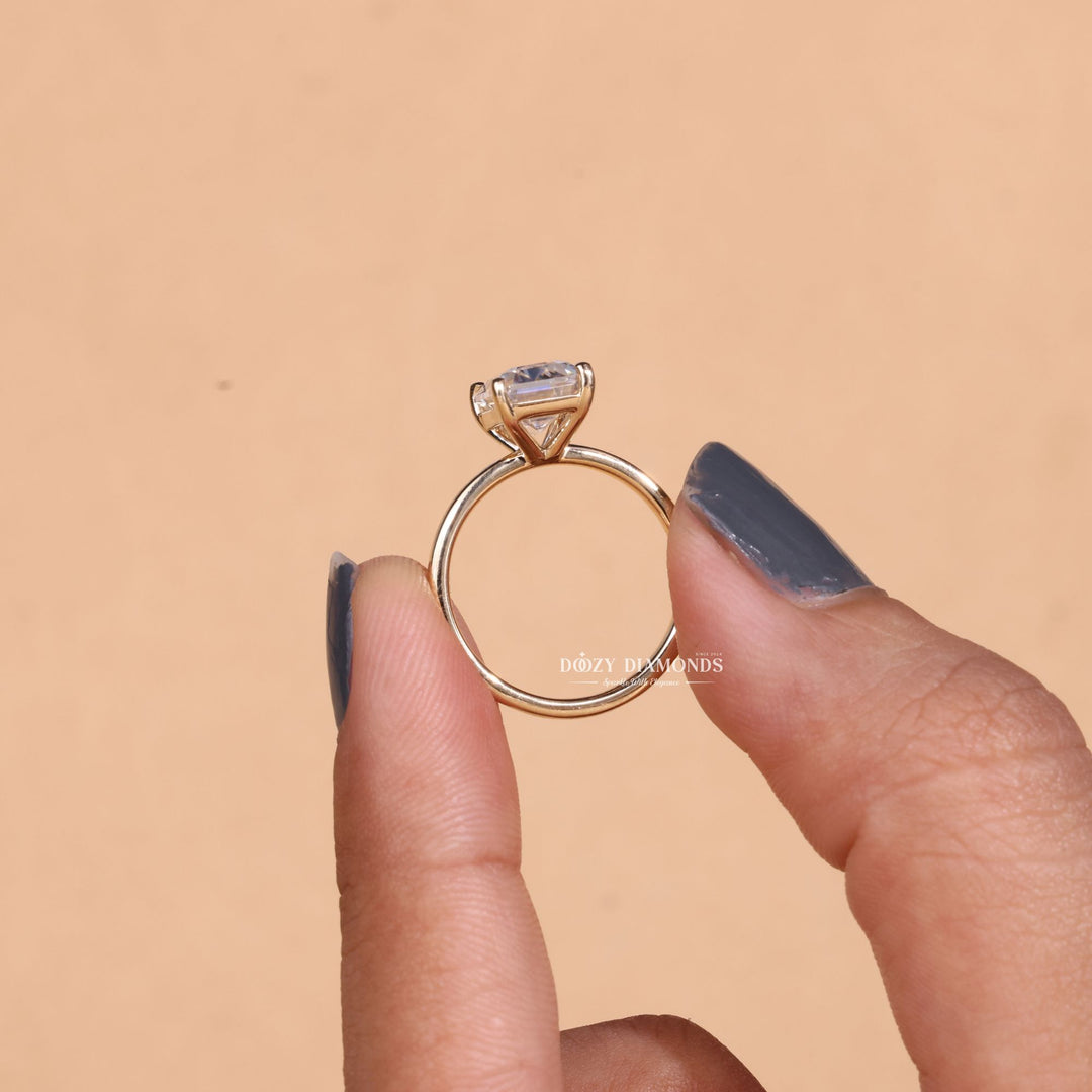 Macro shot of emerald cut diamond facets in solitaire ring setting