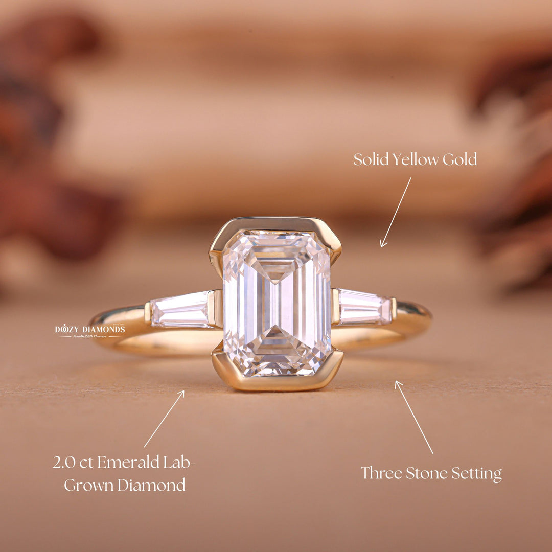 Macro shot of emerald cut diamond facets in three stone ring setting