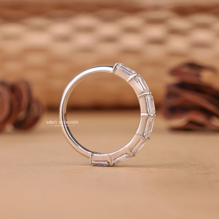 Ethically sourced emerald diamond eternity band
