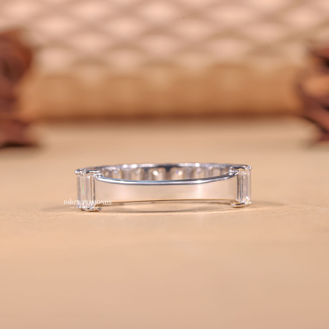 Emerald diamond band stacked with engagement ring