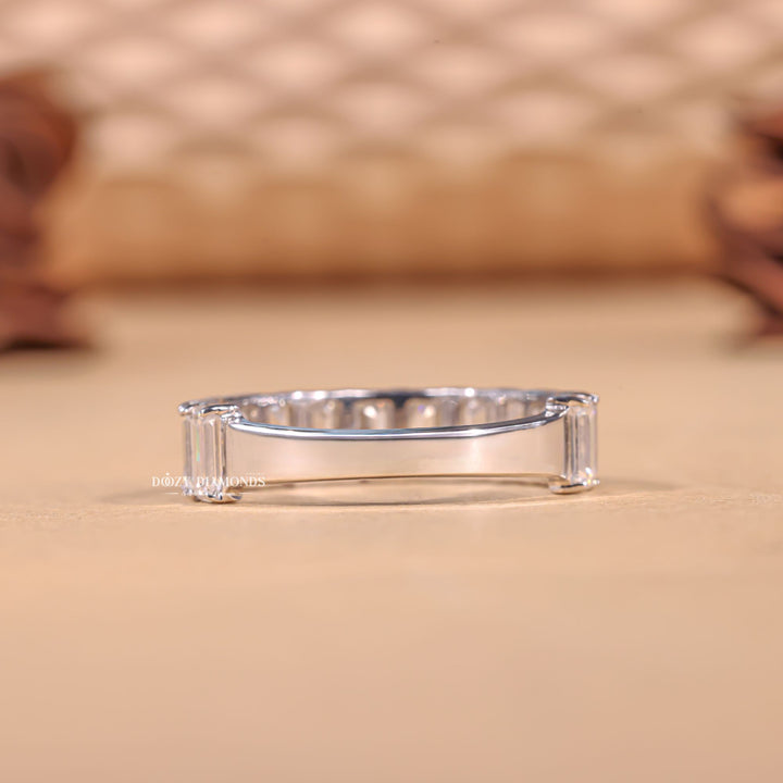 Emerald diamond band stacked with engagement ring