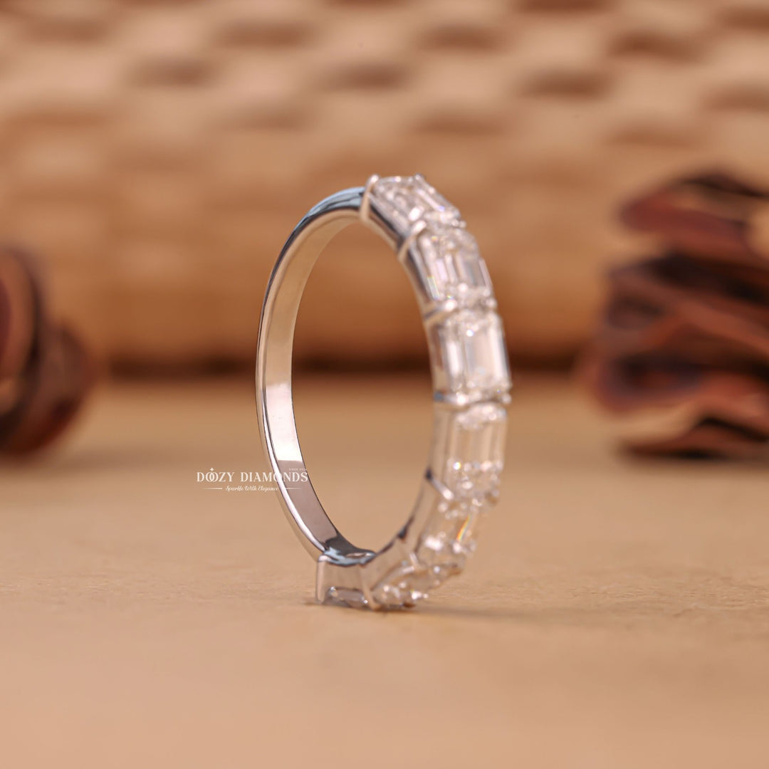 Eternity diamond band stacked with engagement ring